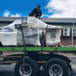 Rigging Services in Cape Town. CNC machine being loaded onto Cape Rigging Service Crane Truck.