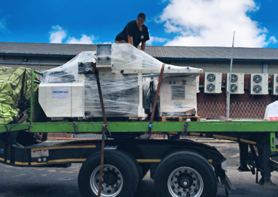 Rigging Services in Cape Town. CNC machine being loaded onto Cape Rigging Service Crane Truck.